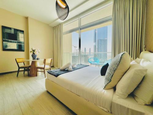 Postel nebo postele na pokoji v ubytování Venduras - Luxury Studio , Hameni Tower, JVC