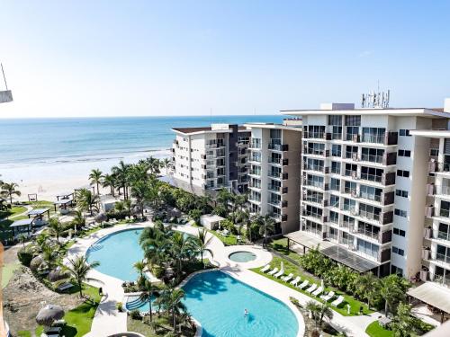 Πισίνα στο ή κοντά στο Ventanas del Mar by Playa Caracol Residences