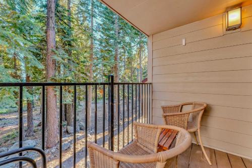a screened porch with two chairs on a deck at Carnelian Bay 2BR + Loft Near Beach & Trails in Carnelian Bay