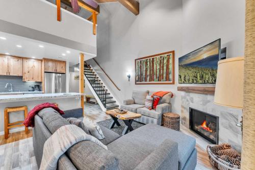 a living room with two couches and a fireplace at Carnelian Bay 2BR + Loft Near Beach & Trails in Carnelian Bay