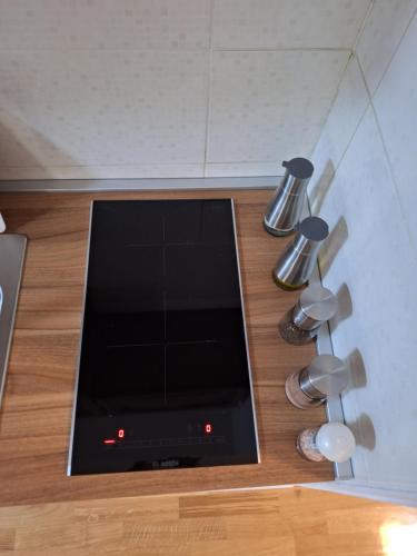 a flat screen tv sitting on top of a wooden floor at STUDIO APARTMAN MARKo C self-check in,frre parking in Karlovac