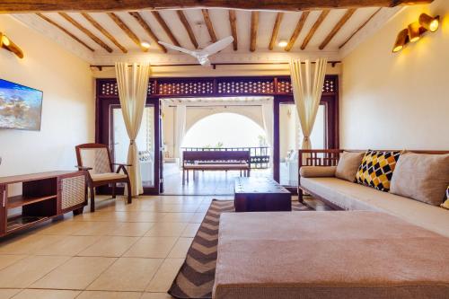 Ένα ή περισσότερα κρεβάτια σε δωμάτιο στο Munje Beach Villas