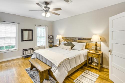 a bedroom with a bed and a ceiling fan at Lumberjack Hideaway Near Campus in Nacogdoches! in Nacogdoches