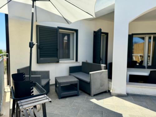 Posedenie v ubytovaní Villa Fiorella Porto Cesareo primo piano 2 locali