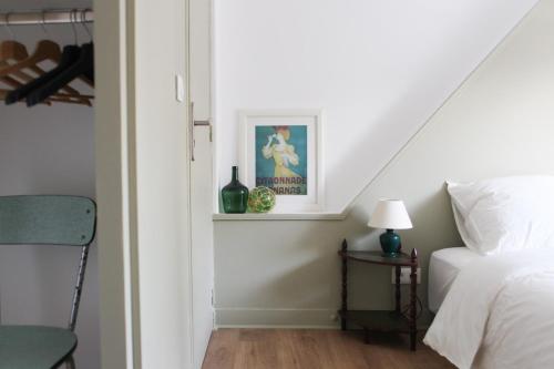 Una cama o camas en una habitación de La Part Entière
