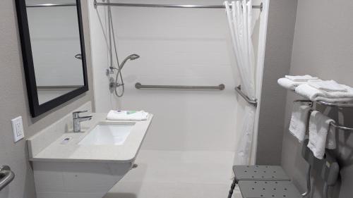 a bathroom with a sink and a shower at Motel 6-Victoria, TX in Victoria