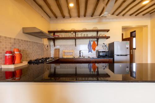 Η κουζίνα ή μικρή κουζίνα στο Munje Beach Villas