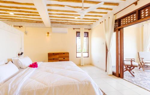 Ένα ή περισσότερα κρεβάτια σε δωμάτιο στο Munje Beach Villas