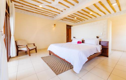 Ένα ή περισσότερα κρεβάτια σε δωμάτιο στο Munje Beach Villas