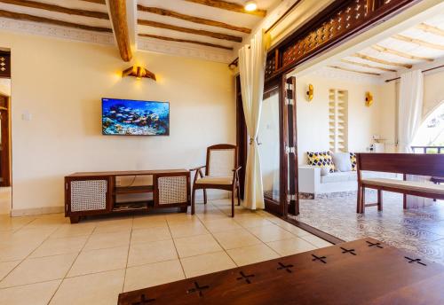 Μια τηλεόραση ή/και κέντρο ψυχαγωγίας στο Munje Beach Villas