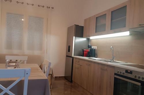 Kuchyň nebo kuchyňský kout v ubytování Milos Casa dei Gemelli