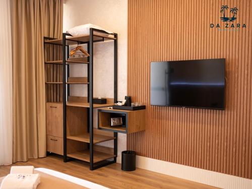 TV a/nebo společenská místnost v ubytování Da Zara Hotel