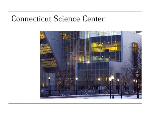 a large glass building with lights in front of it at Convention Center 1BR Condo Downtown Hartford and GYM in Hartford