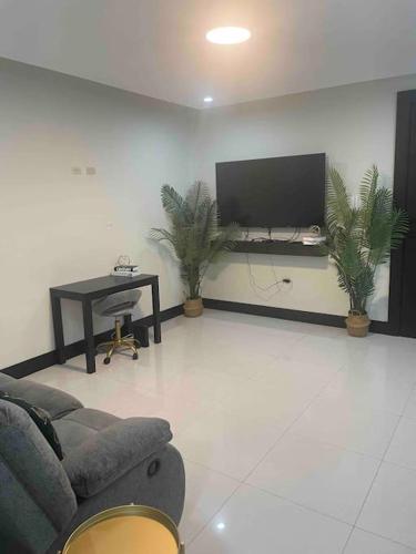 Μια τηλεόραση ή/και κέντρο ψυχαγωγίας στο Paddington terrace 1br Apt