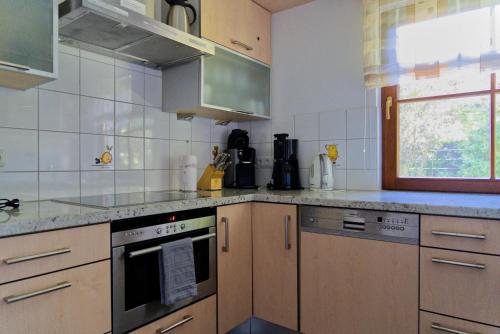 Η κουζίνα ή μικρή κουζίνα στο Ferienhaus Schwalbennest