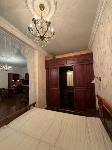 Postel nebo postele na pokoji v ubytování Gold Residence