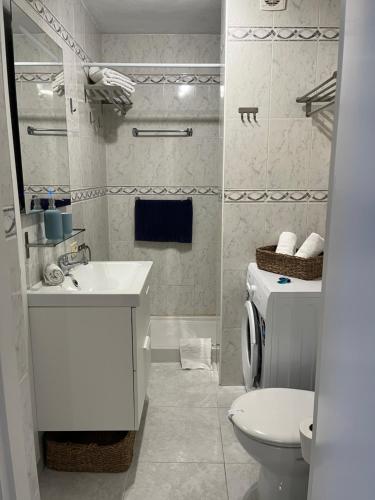 A bathroom at TORRES DEL SOL 15 floor THE HIGHTEST