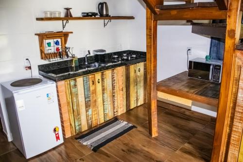 Dapur atau dapur kecil di Villa Park Chalés - A sua fazendinha ao lado do Beto Carrero
