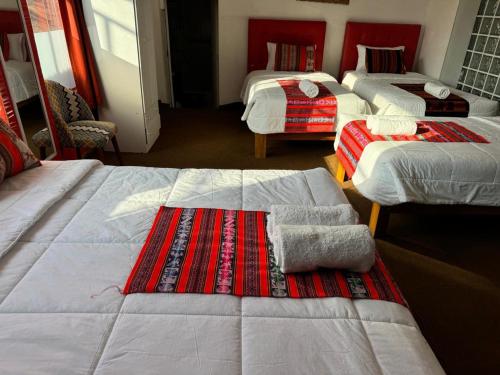 Postel nebo postele na pokoji v ubytování Hotel Plateros