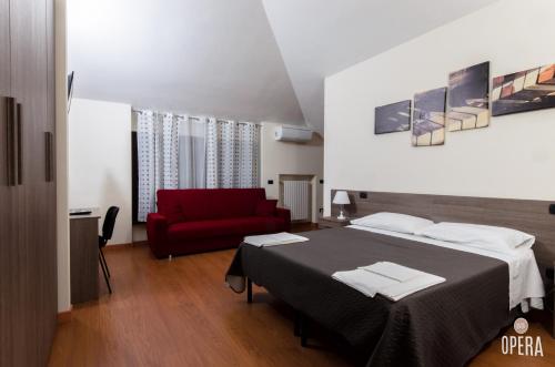 Postel nebo postele na pokoji v ubytování Opera B&B