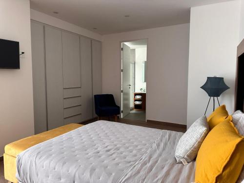 Cama o camas de una habitación en depto L-Phant-Cascatta