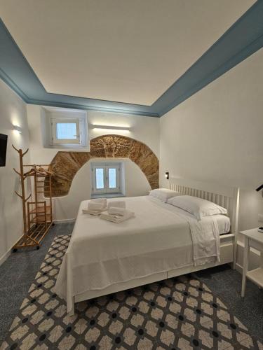Ένα ή περισσότερα κρεβάτια σε δωμάτιο στο Casa Novelli 22