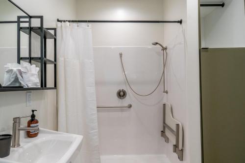 a bathroom with a shower and a sink at Casitas at Capitol Reef in Torrey