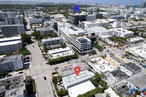 an aerial view of a city with a red marker at Baybreeze Apartments by Lowkl in Miami Beach