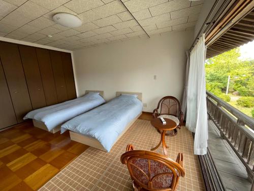 Postel nebo postele na pokoji v ubytování temple stay 玉林寺