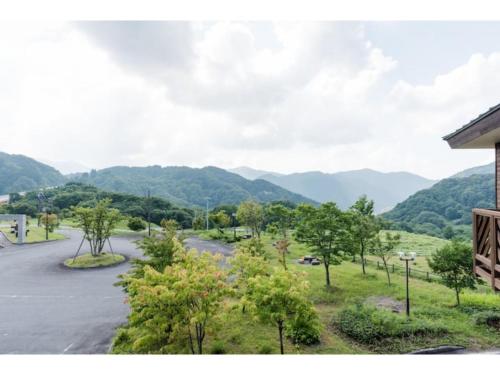 a view of a road with mountains in the background at Mikuni Lodge - Vacation STAY 61542v in Tari
