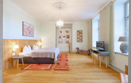 Ένα ή περισσότερα κρεβάτια σε δωμάτιο στο One-Bedroom Apartment In Krakow Am See