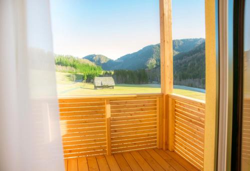 a room with a window with a view of a mountain at Gasthof Wachter in Gaal