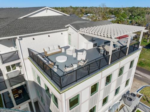an aerial view of a building with a balcony at Alpha Blu by Pristine Properties Vacation Rentals in Saint Joe Beach