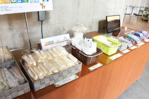a counter with food items on display in a store at Biei Shirogane Onsen Hotel Park Hills in Biei