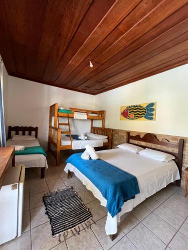Postel nebo postele na pokoji v ubytování Pousada Brisamar Paraty COMECE O DIA COM UM CAFÉ DA MANHÃ INESQUECÍVEL