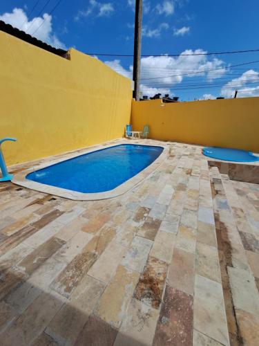 Kolam renang di atau dekat dengan Casa & lazer - Com piscina aquecida e churrasqueira