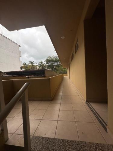 an empty hallway of a building with a roof at Lolitas Suites 304 in Zihuatanejo