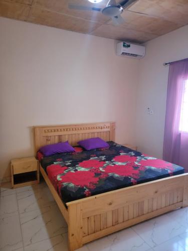 Ένα ή περισσότερα κρεβάτια σε δωμάτιο στο Touray holiday rental