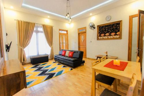 Гостиная зона в Villa D'Maguwo Suites