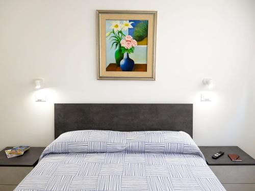Ένα ή περισσότερα κρεβάτια σε δωμάτιο στο Apartment in Sicily with Stunning Sea View