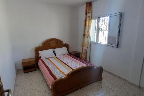 Ένα ή περισσότερα κρεβάτια σε δωμάτιο στο Superbe Appartement Proche de la Plage