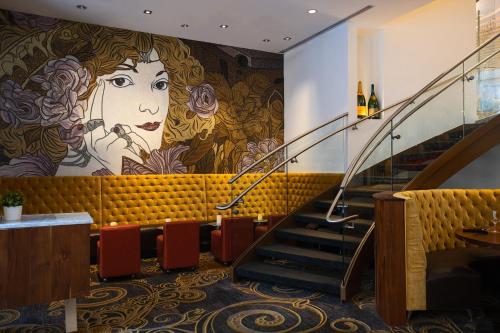a mural of a woman on the wall in a restaurant at Westin Georgetown, Washington D.C. in Washington