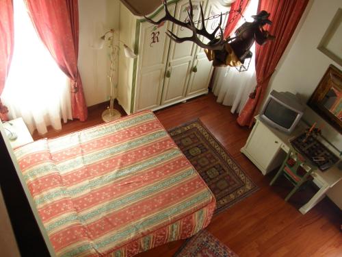 Postel nebo postele na pokoji v ubytování Residence Meuble' Cortina
