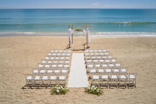 a wedding ceremony set up on the beach at Marriott Hutchinson Island Beach Resort, Golf & Marina in Stuart