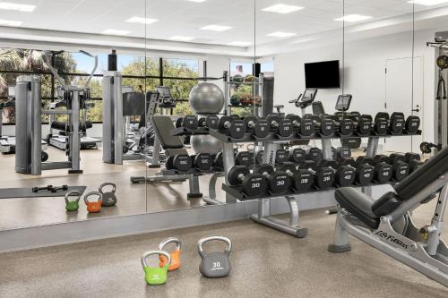 a fitness room with a gym with tread machines at The Westin Desert Willow Villas, Palm Desert in Palm Desert