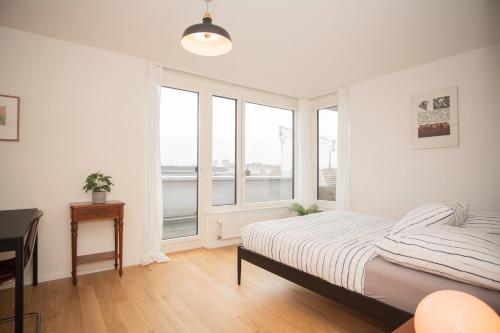 Top floor studio with terrace and free BaselCard