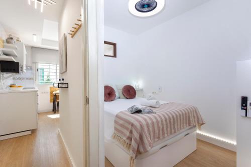 Ένα ή περισσότερα κρεβάτια σε δωμάτιο στο Sunstay Center Flat I Arroyo De La Miel