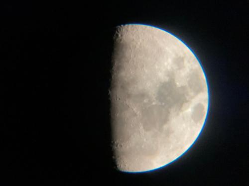a close up of the moon with at «ГОРИ́ЩЕ на площі Польський ринок» in Kamianets-Podilskyi