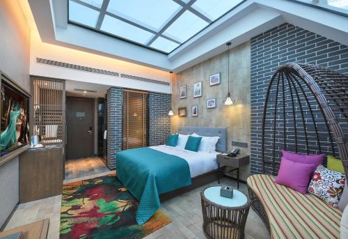 Ένα ή περισσότερα κρεβάτια σε δωμάτιο στο Meihao Hotel Horses Huaqing Palace
