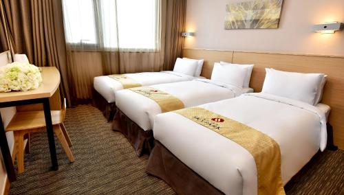 Postelja oz. postelje v sobi nastanitve Hotel Skypark Dongdaemun I